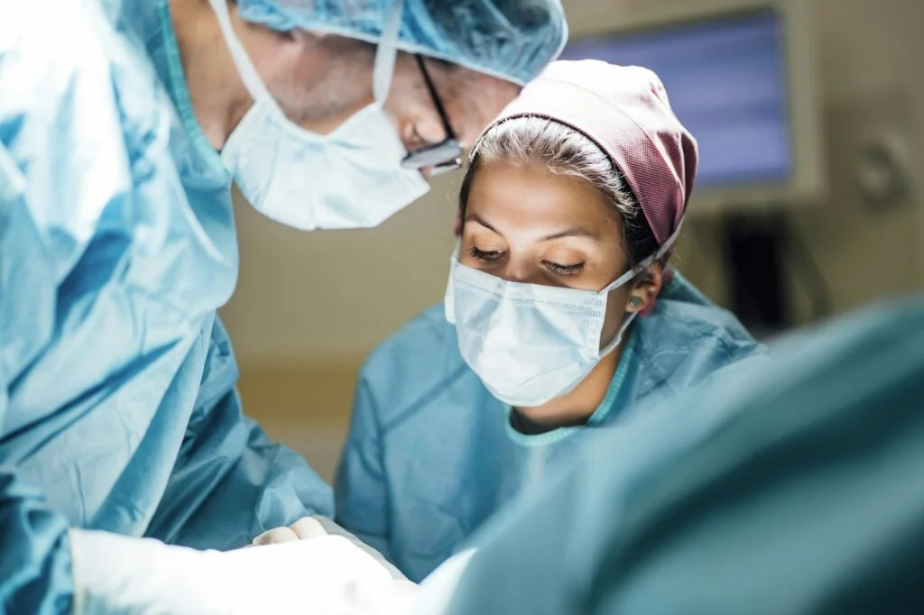 Doctors performing surgery