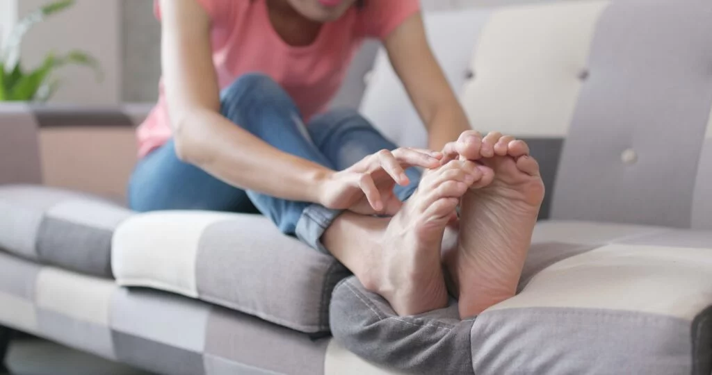 Person checking their feet